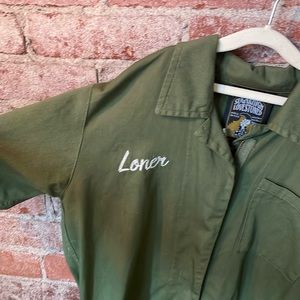 Sugar high lovestoned hunter green romper with loner embroidery